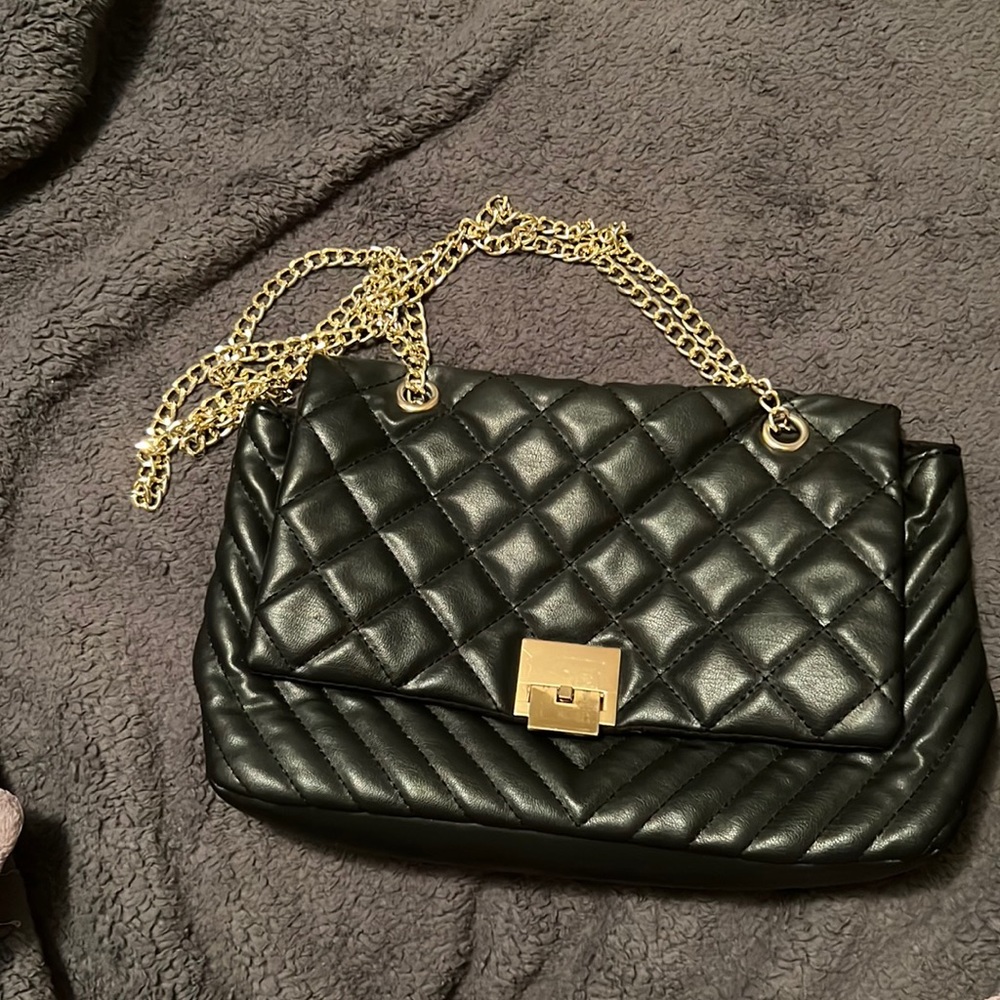 Black quilted purse with gold chain